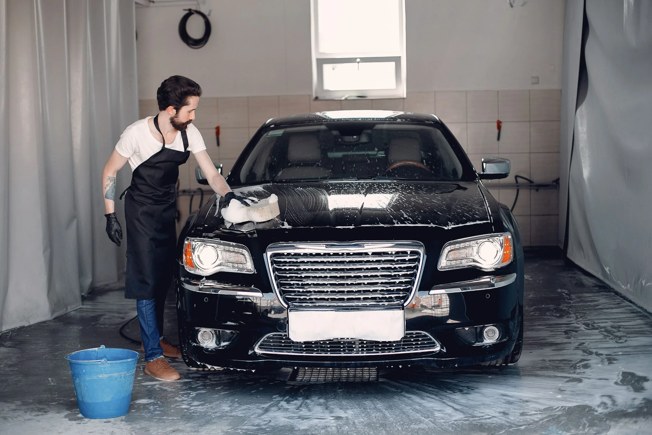 man-washing-his-car-garage-1-scaled