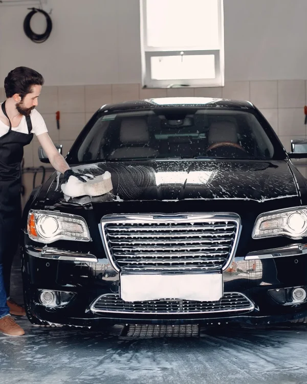 man-washing-his-car-garage-1-scaled