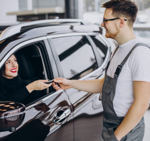mechanic-with-client-car-service-station.jpg
